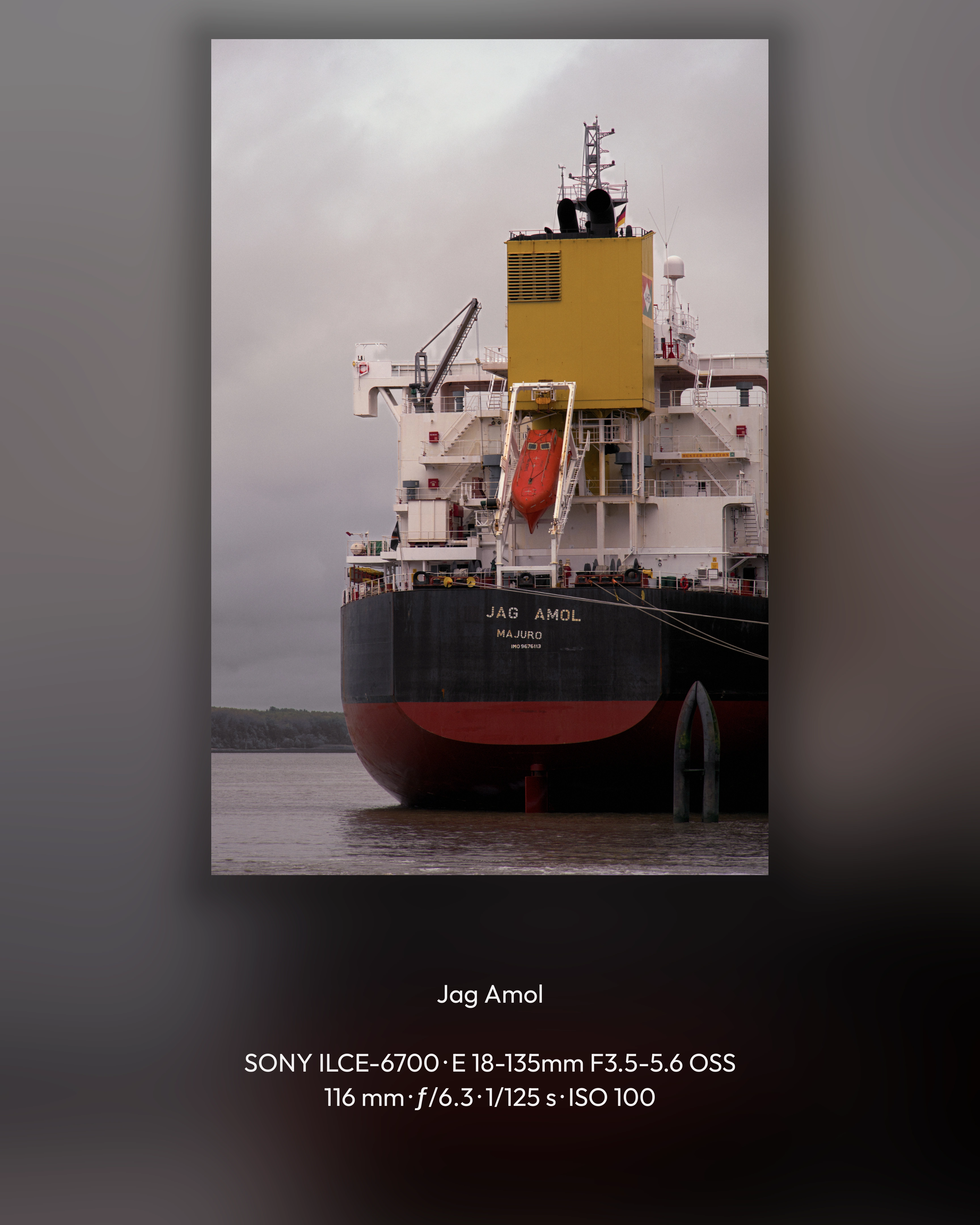 A portrait Showcase export of the ship, framed on a blurred photographic background with camera and exposure details beneath.